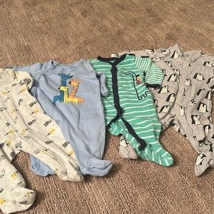 Boys one piece sleepers size 3-6 months. Variety of brands.